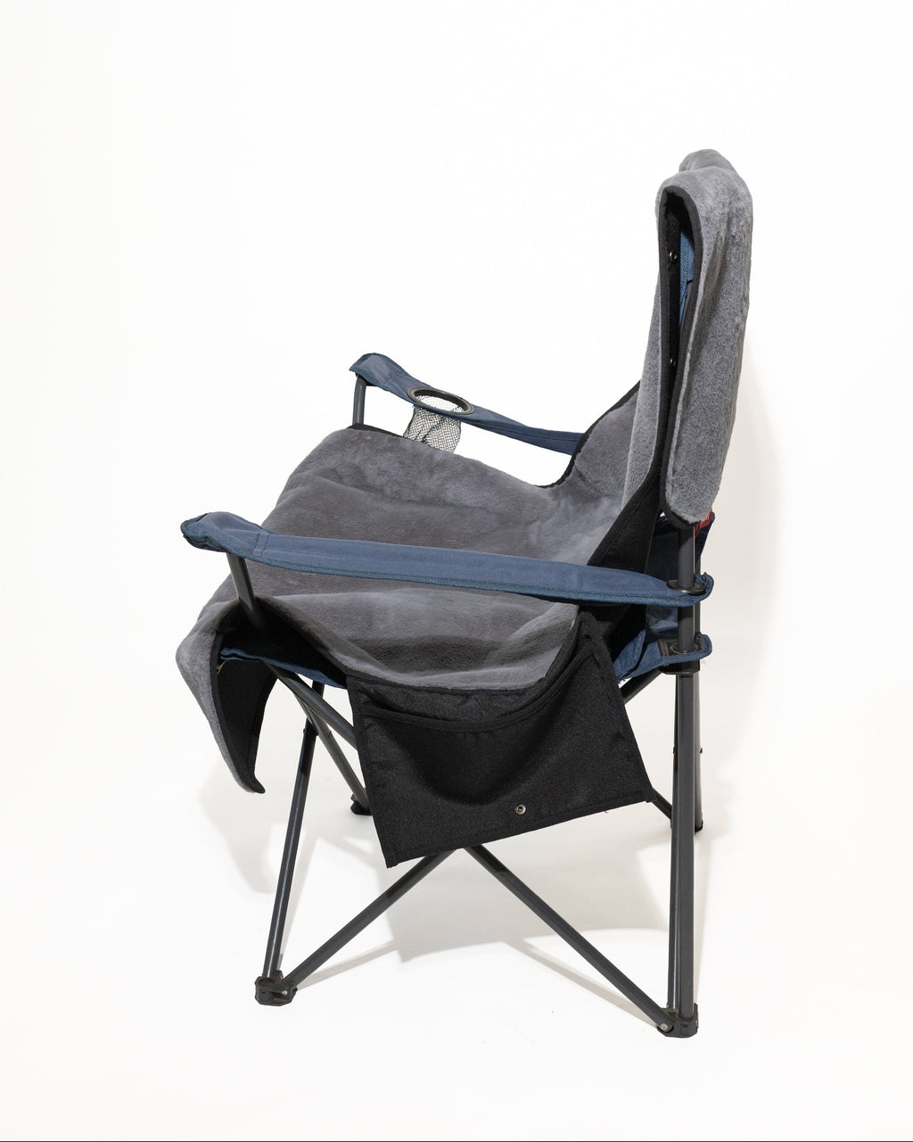 A folding camp chair with a grey fabric seat cover shown from a side angle on a white background.