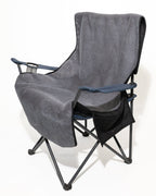 Grey faux fur cover fitted to a standard folding camping outdoor chair.