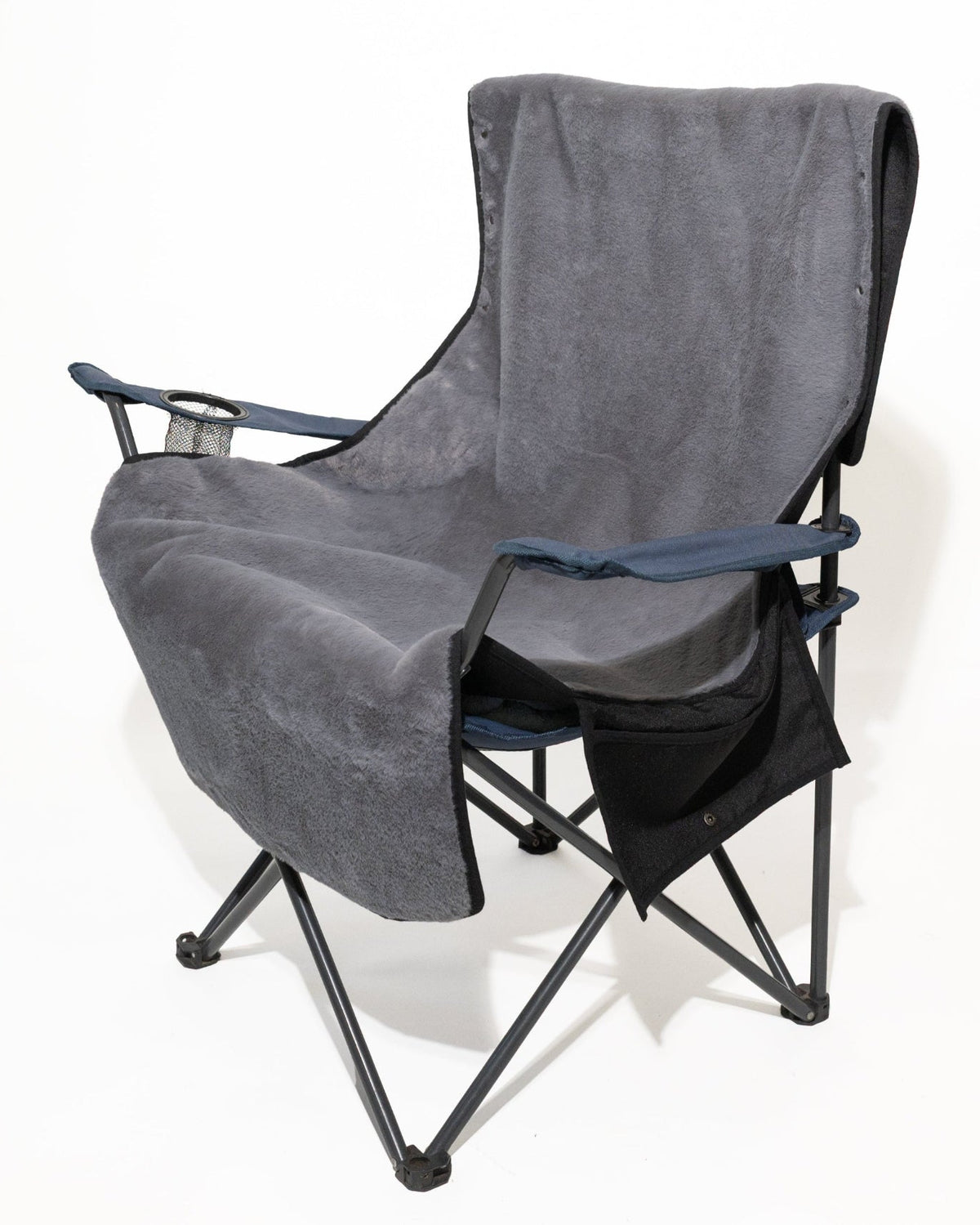 Grey faux fur cover fitted to a standard folding camping outdoor chair.