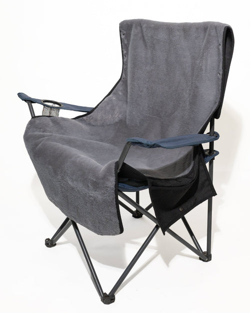 Grey faux fur cover fitted to a standard folding camping outdoor chair.