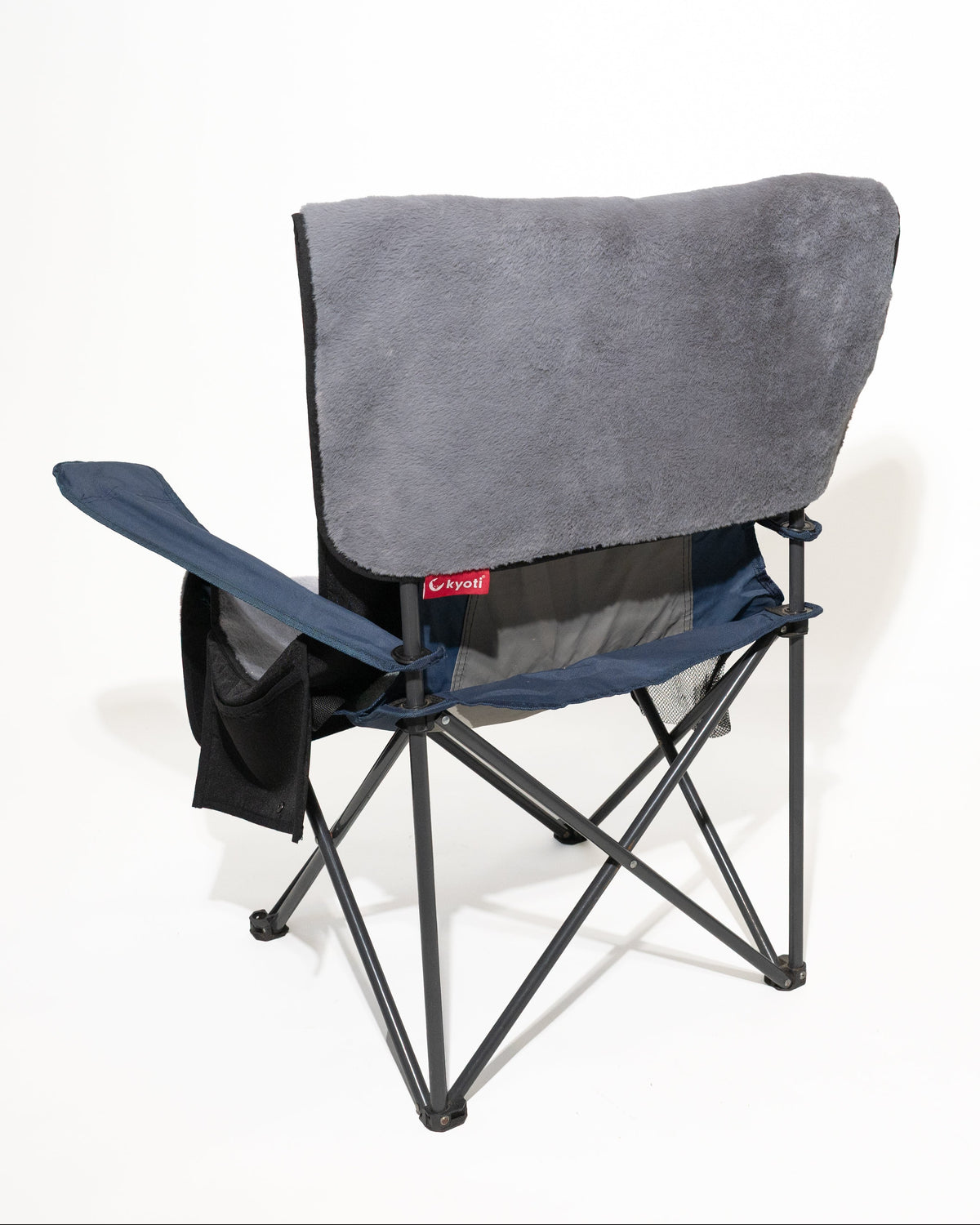 A folding camp chair with a grey fabric seat cover shown from a side angle on a white background.