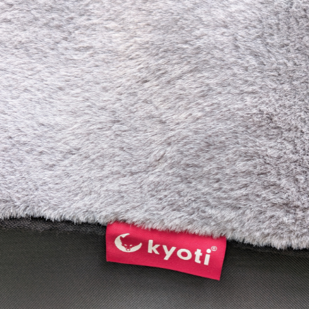 Grey faux fur and black canvas with label kyoti